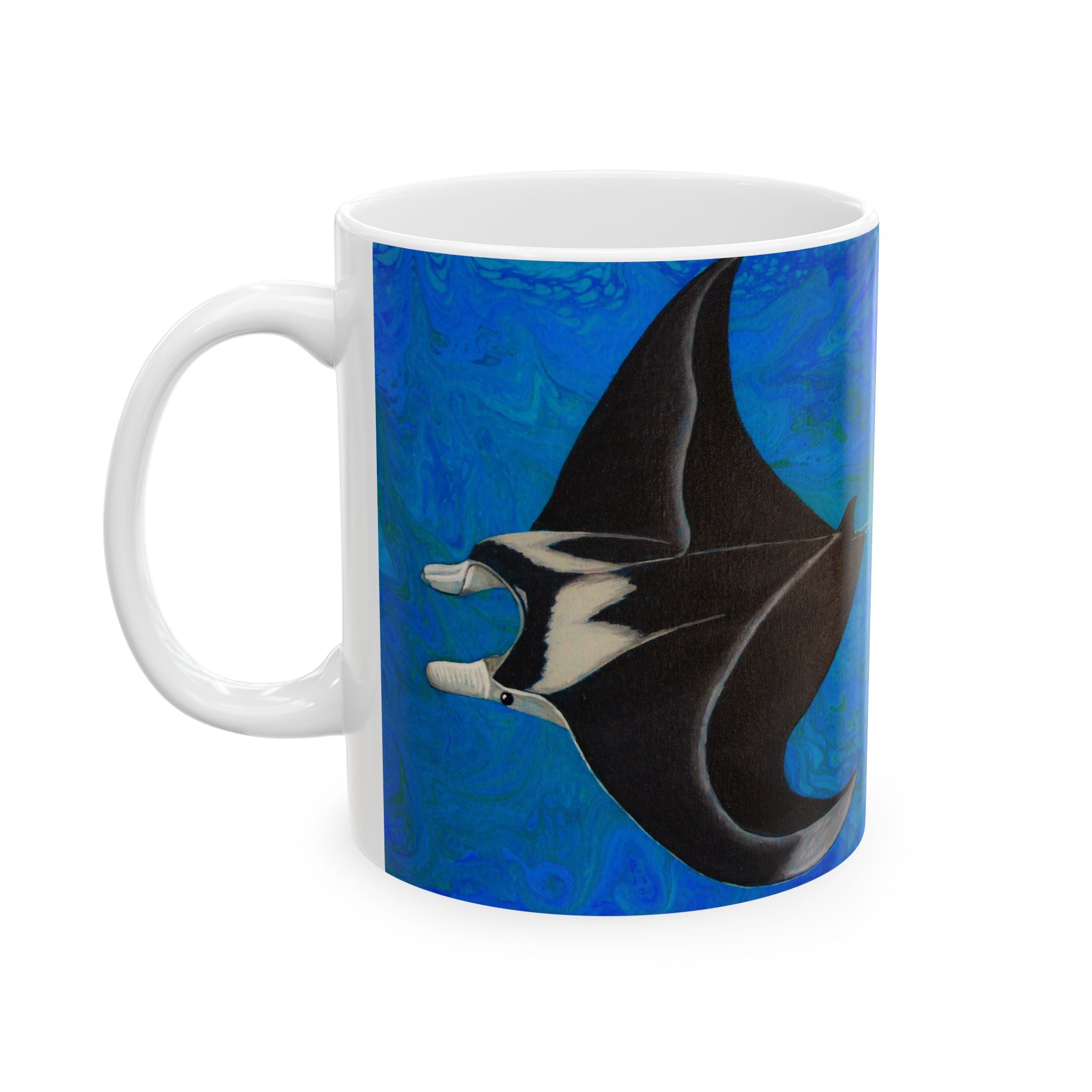 Mug with a manta ray design on a blue background