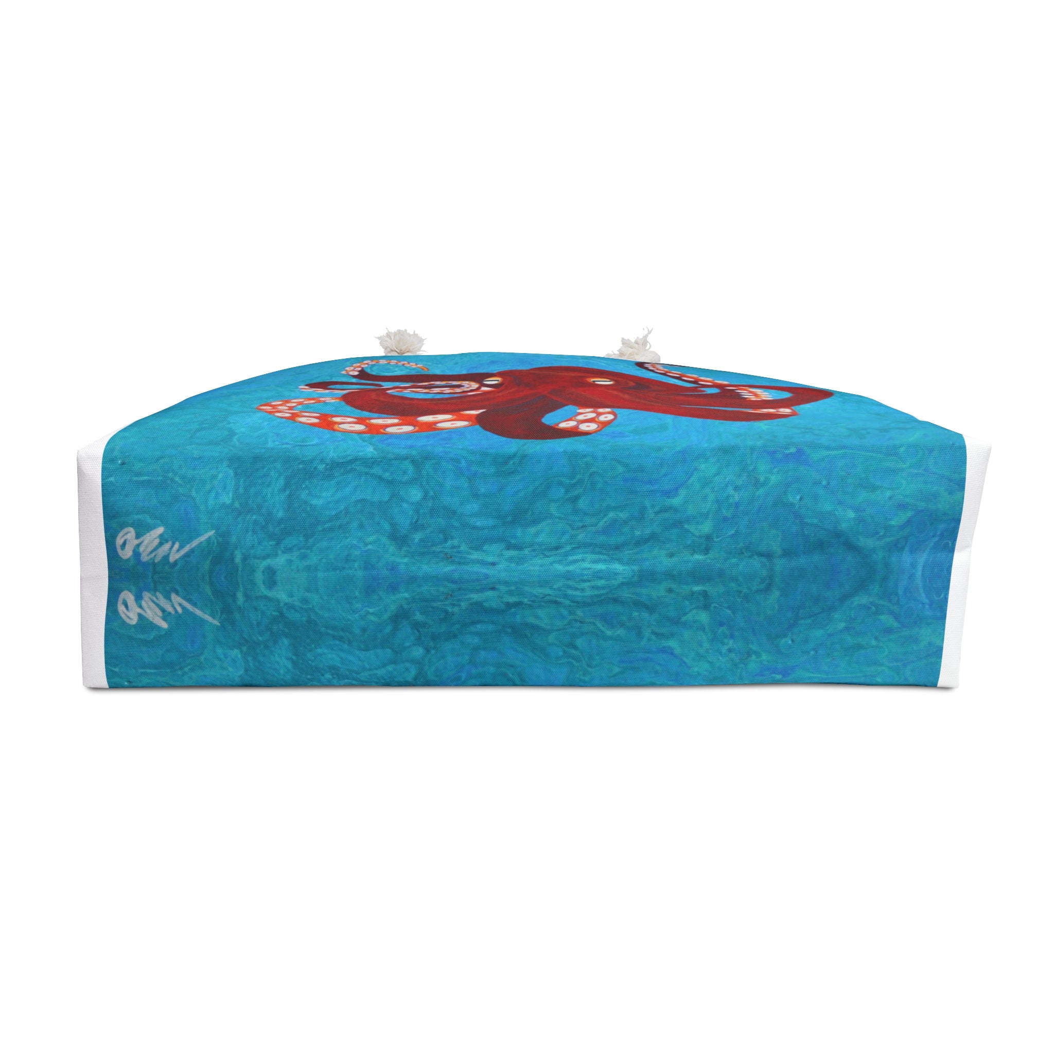 Blue background with a red octopus design on a white background bottom of bag