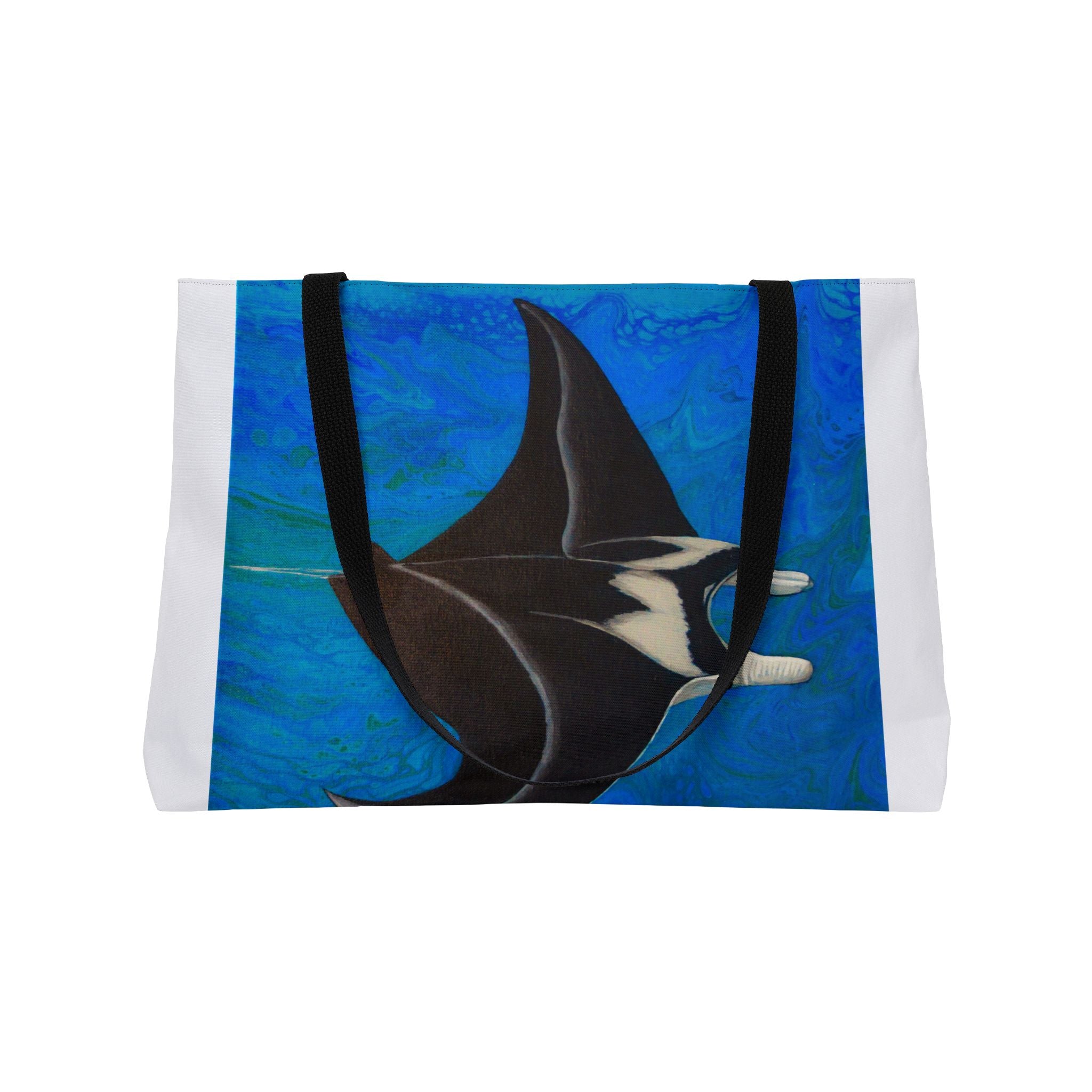 Tote bag with a manta ray design on a blue and white background