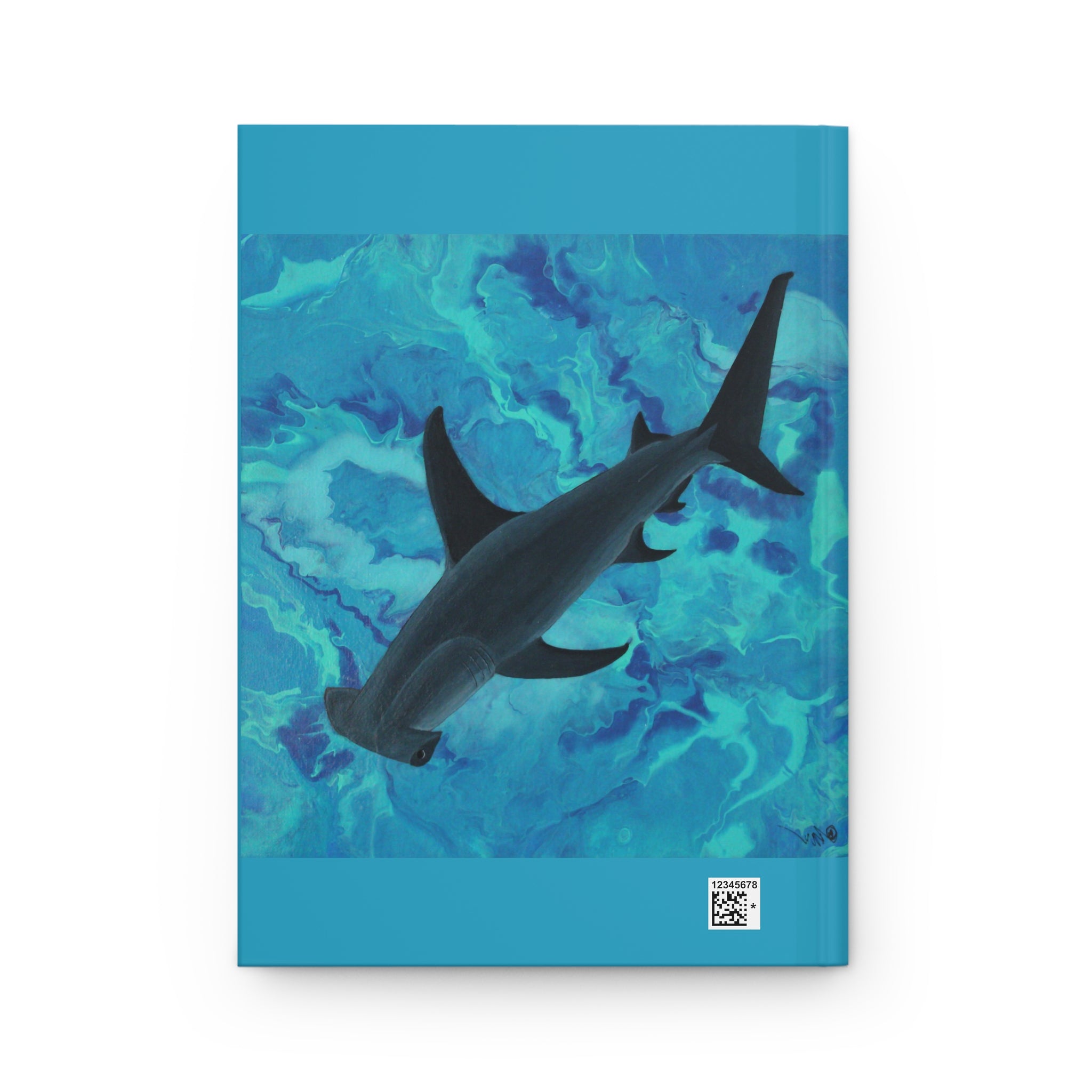 Notebook with a shark design on a blue watercolor background