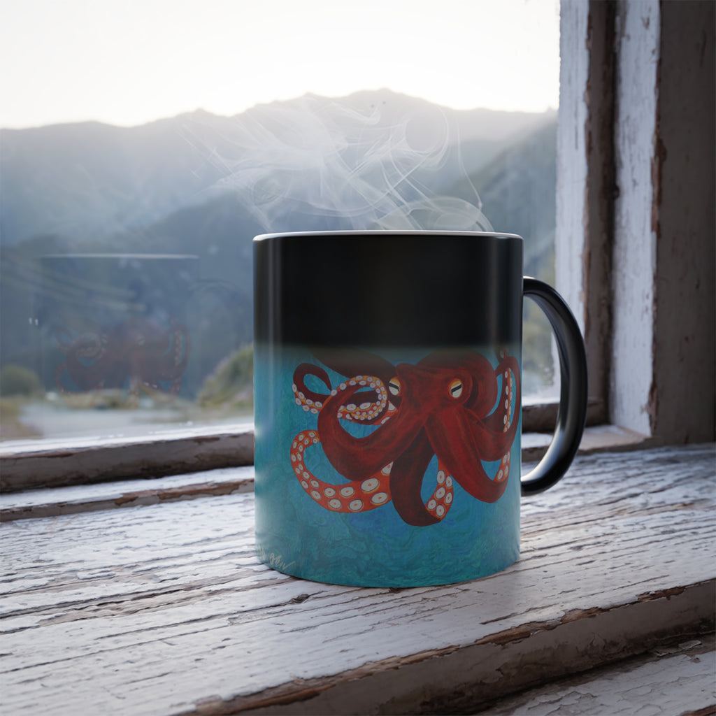 Mug with an octopus design on a windowsill with a mountain view