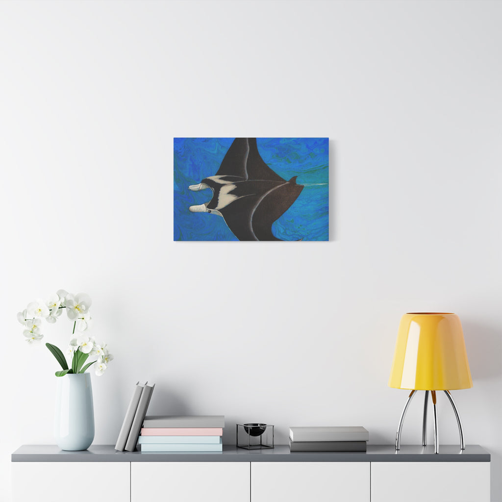 Artistic depiction of a manta ray on a blue background, displayed above a white shelf with decorative items.