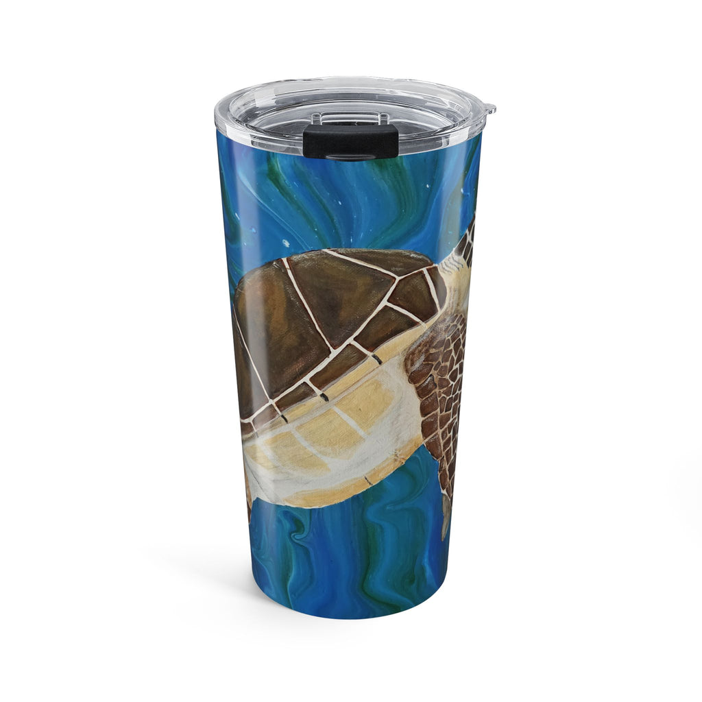 Tumbler with a turtle design on a blue background