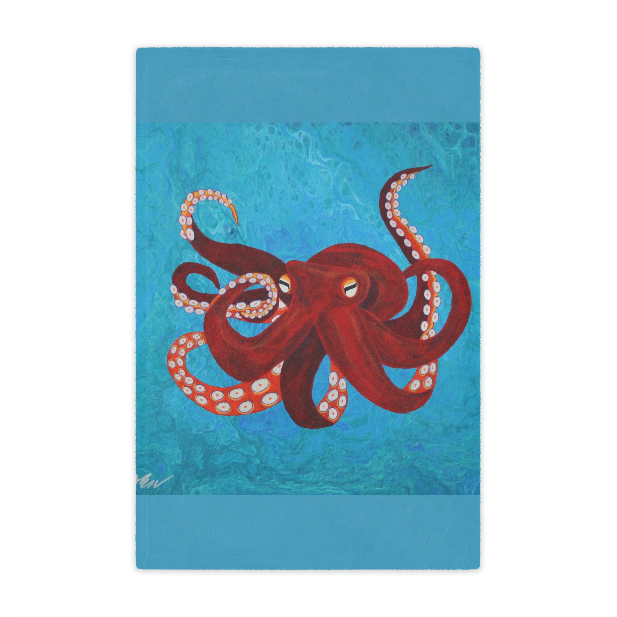 Blanket with a red octopus design on a blue background