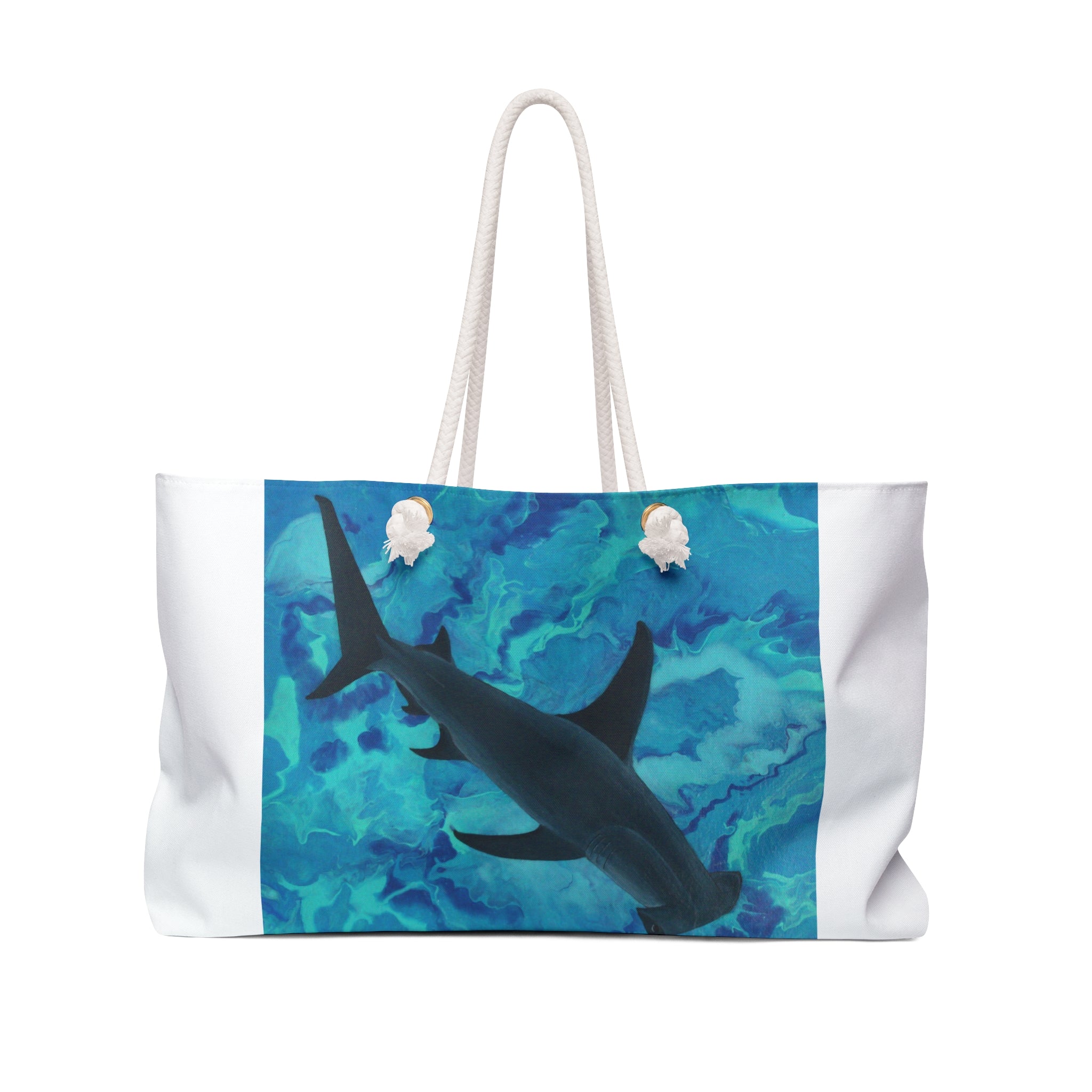 Tote bag with a shark design on a blue and green watercolor background