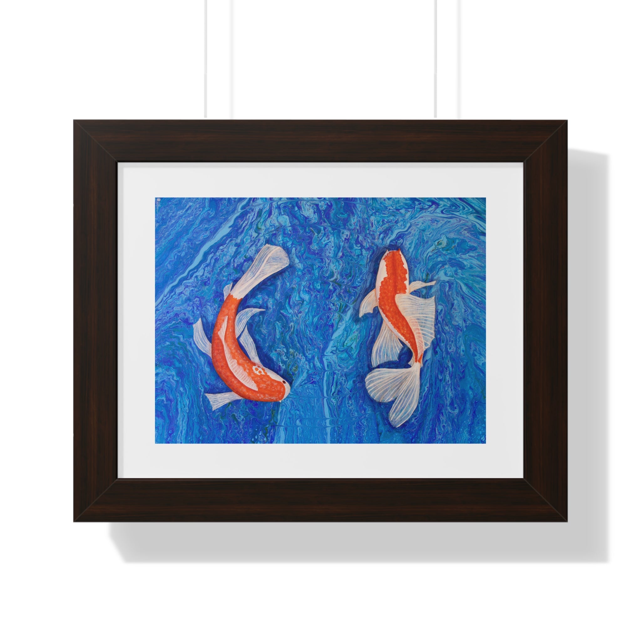 Framed artwork of two koi fish on a blue background