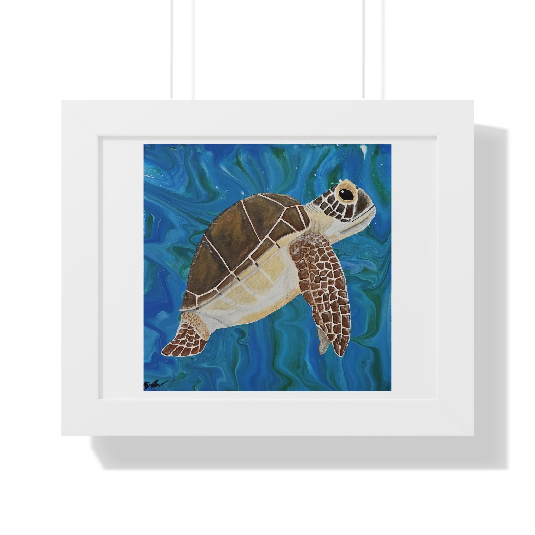 Framed artwork of a turtle swimming in blue water