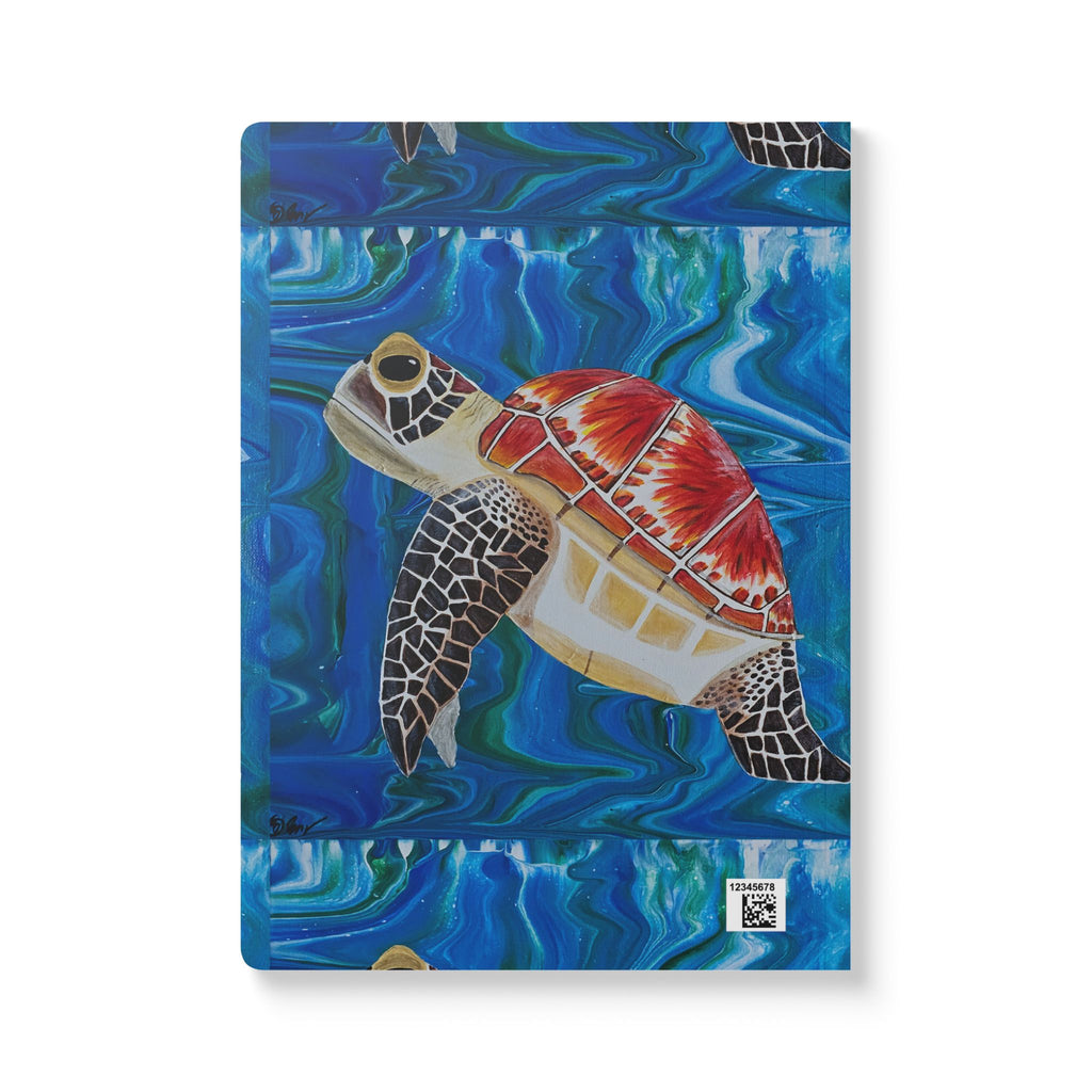Notebook with a turtle design on a blue abstract background