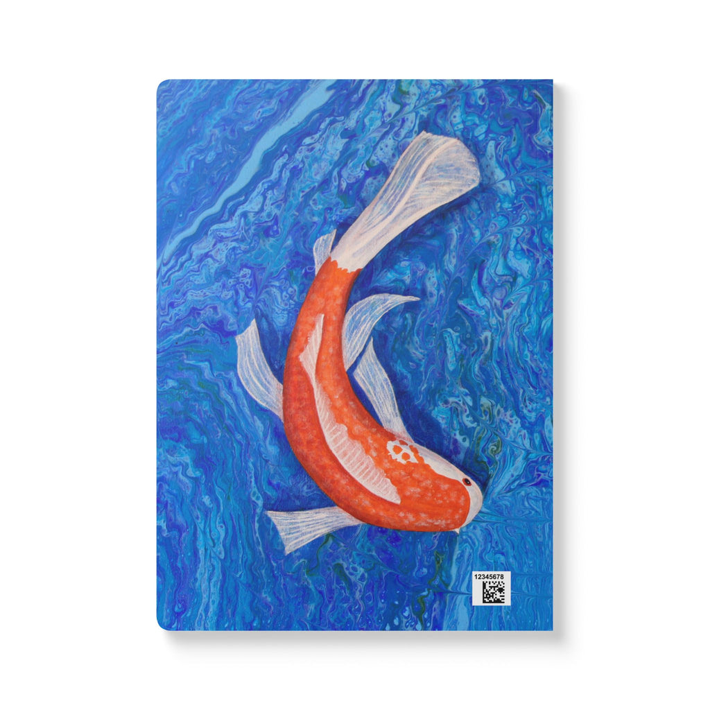 Notebook with a koi fish design on a blue watercolor background