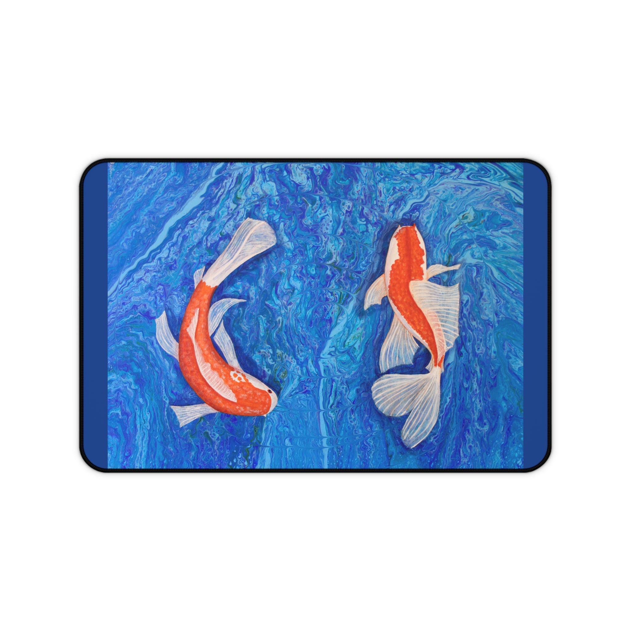 Desk mat with two koi fish design on a blue water background