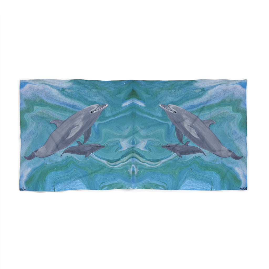 Towel/blanket with dolphin design on a blue and green abstract background