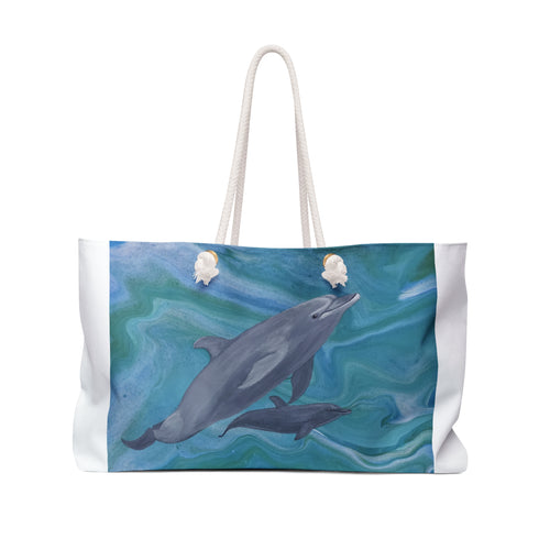 Tote bag with dolphins design on a white background