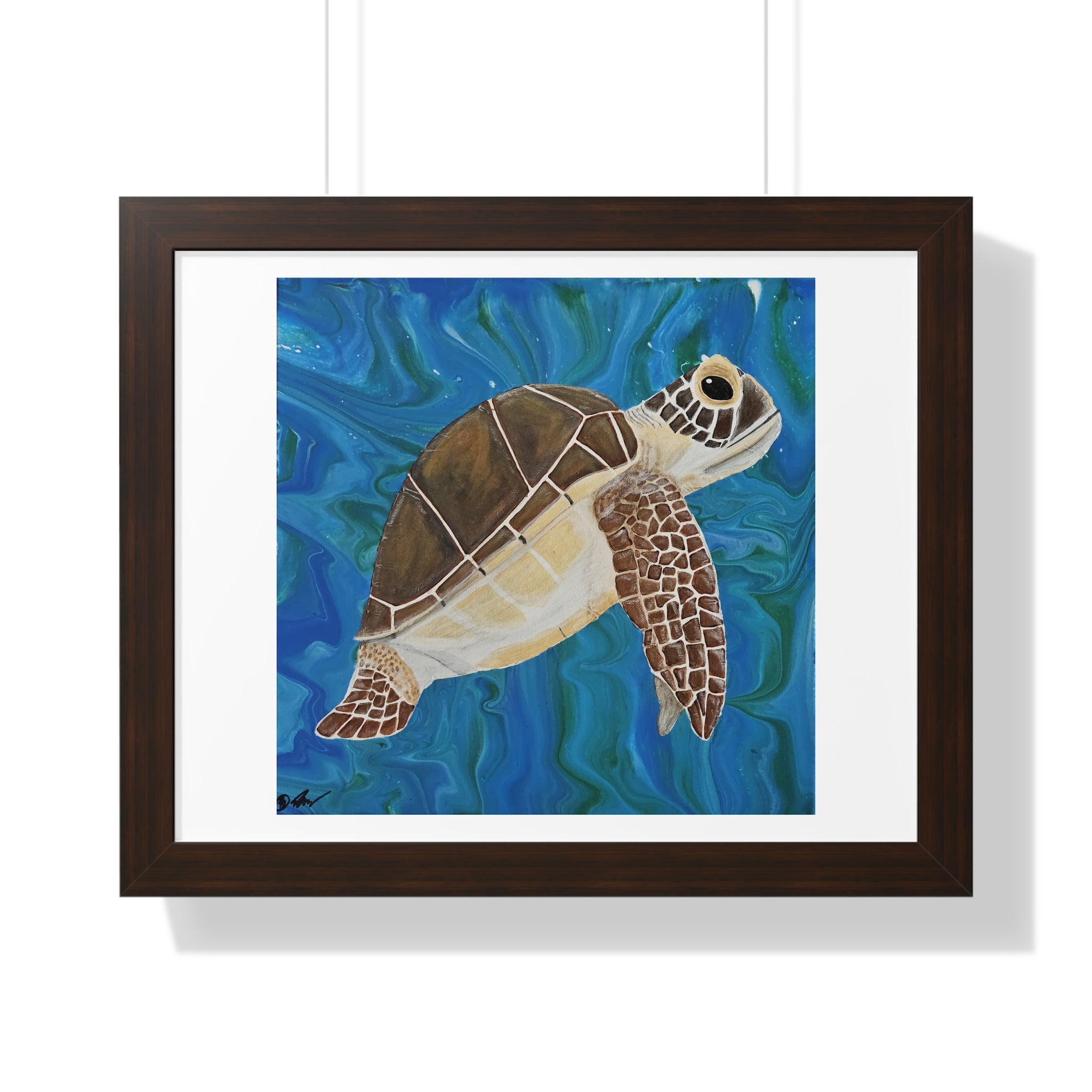 Framed artwork of a turtle swimming in blue water