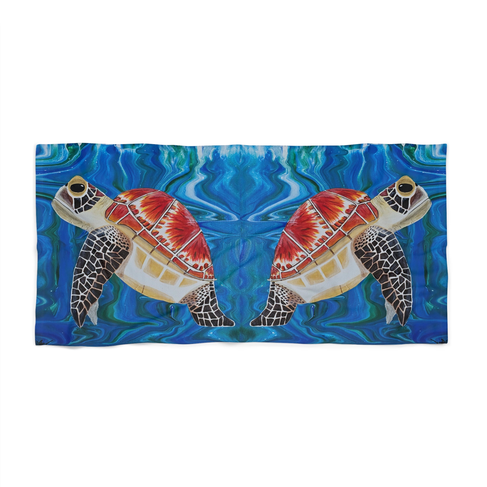 Towel/blanket with a design of two turtles on a blue water background