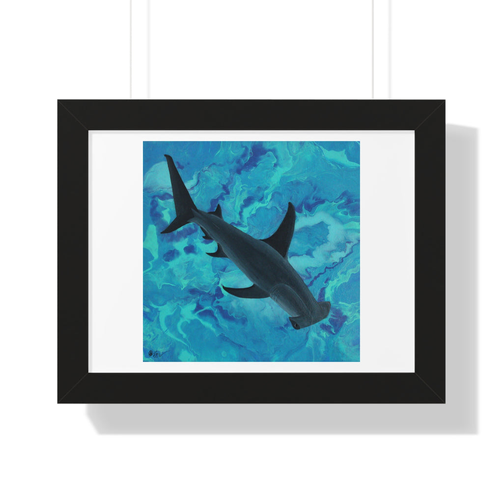 Framed artwork of a shark silhouette against a blue abstract background