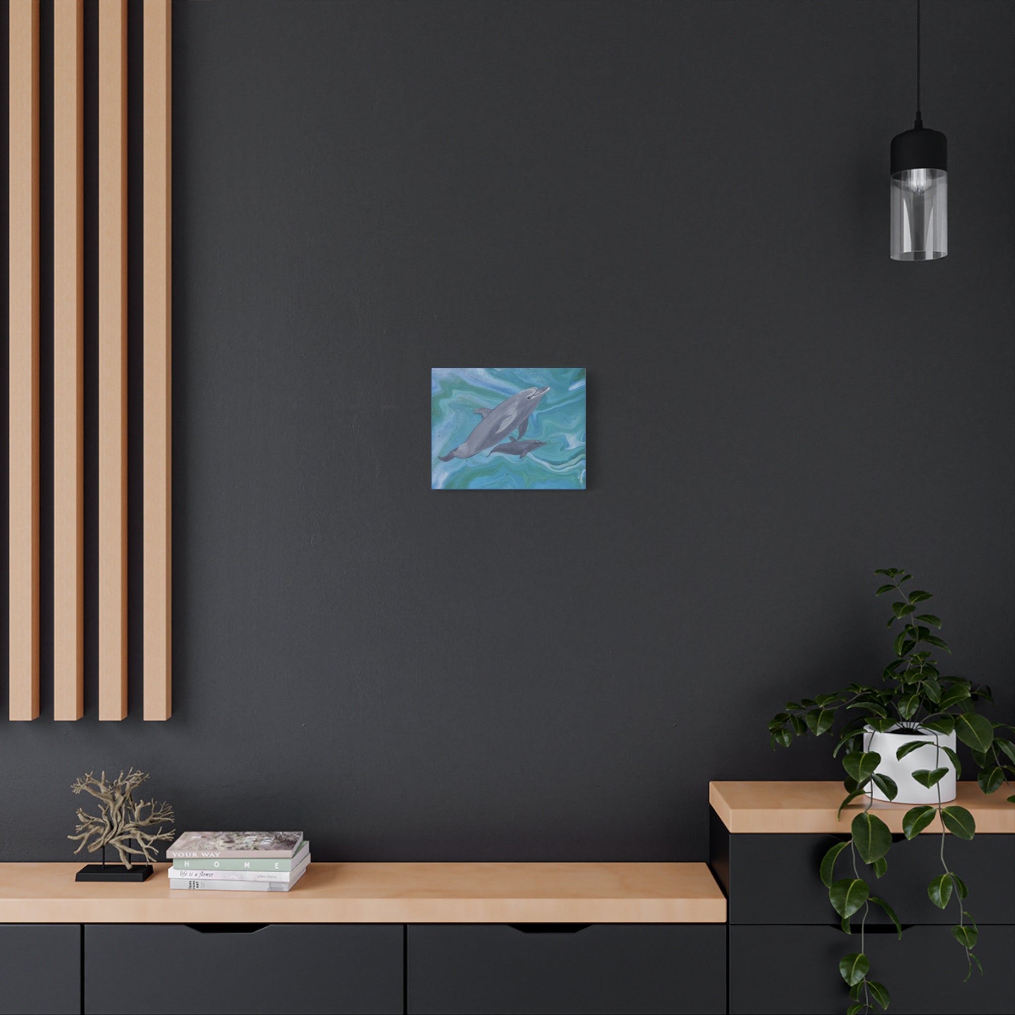 Very small dolphin print on canvas. Modern interior with a dark wall, wooden shelves, and a plant.