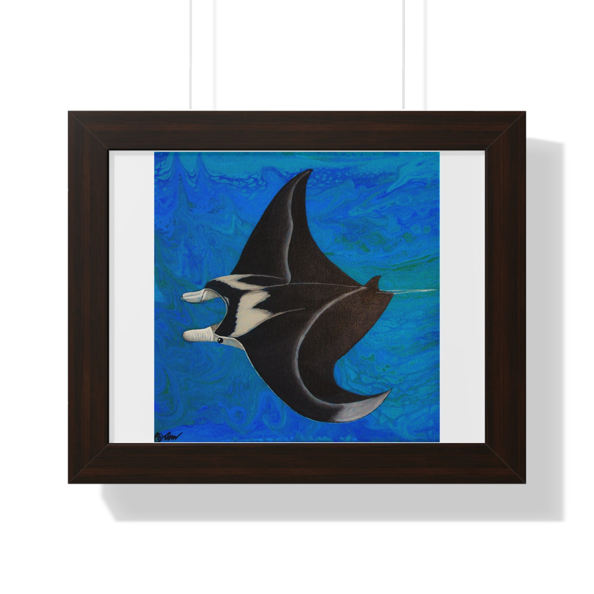 Framed artwork of a manta ray on a blue background