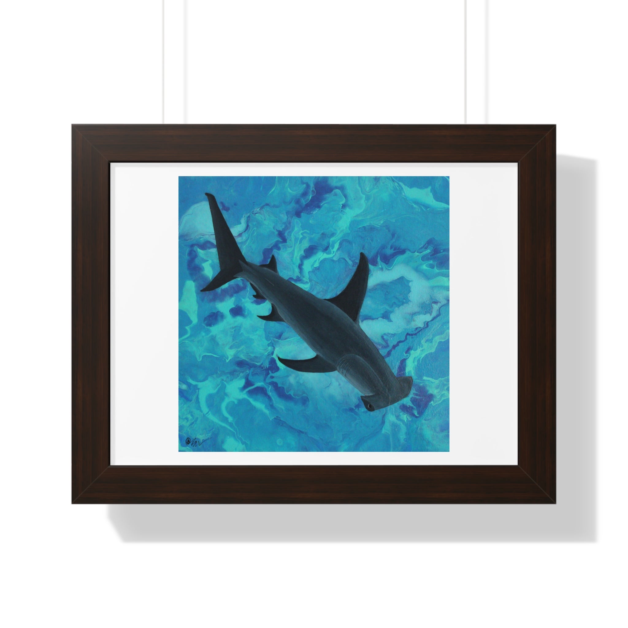 Framed artwork of a shark silhouette on a blue abstract background