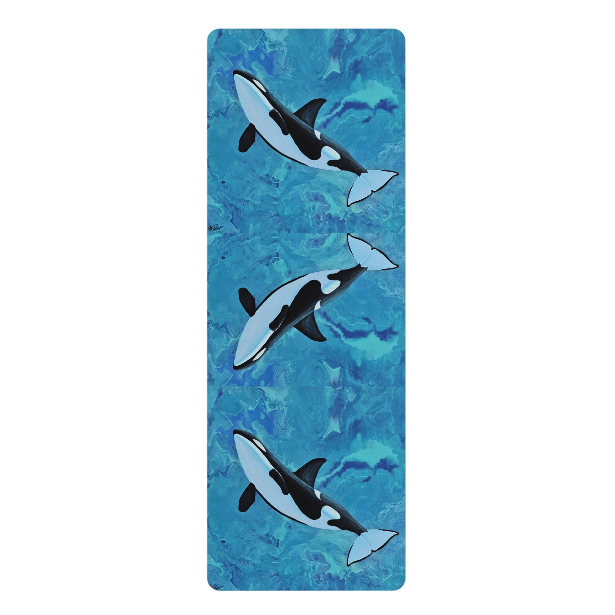 Yoga mat with orca whale design on a blue watercolor background