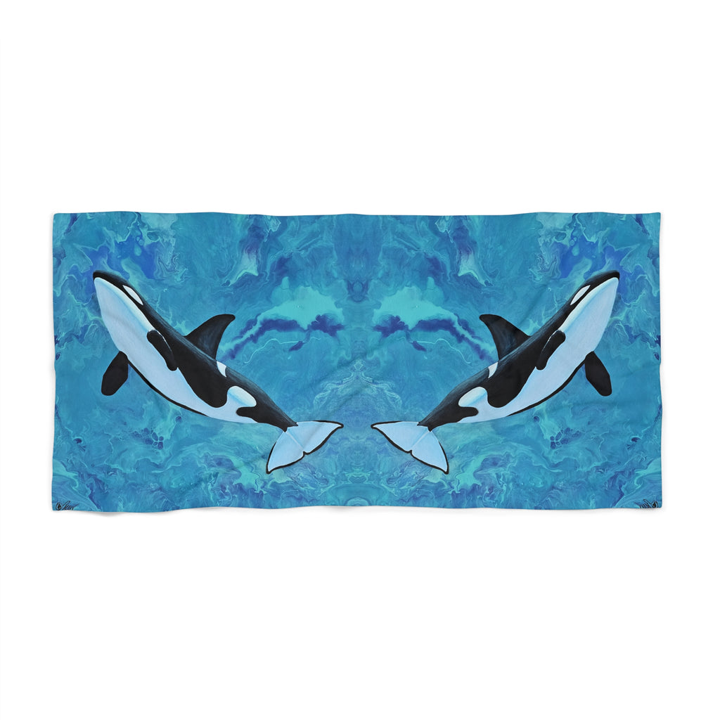 Towel/blanket with orca whale design on a blue abstract background