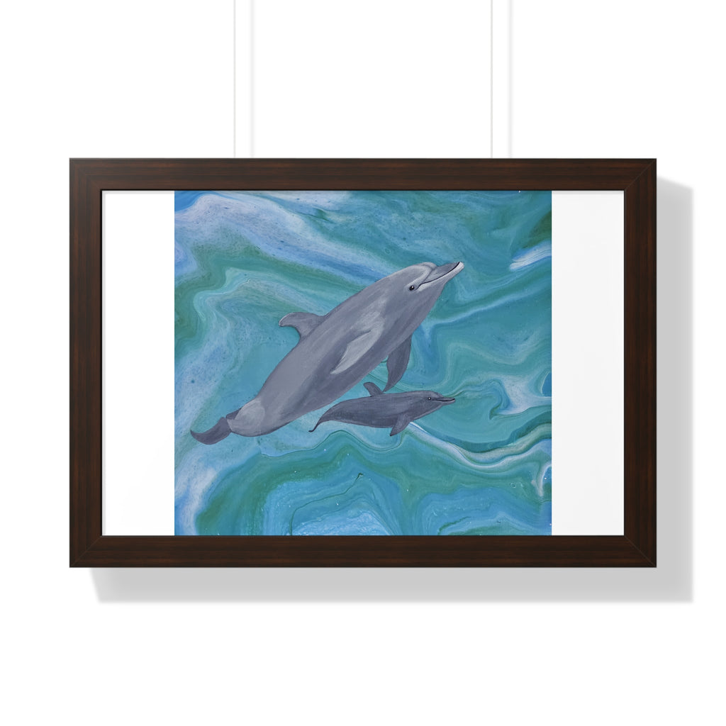 Framed artwork of dolphins swimming in water with a wooden frame.