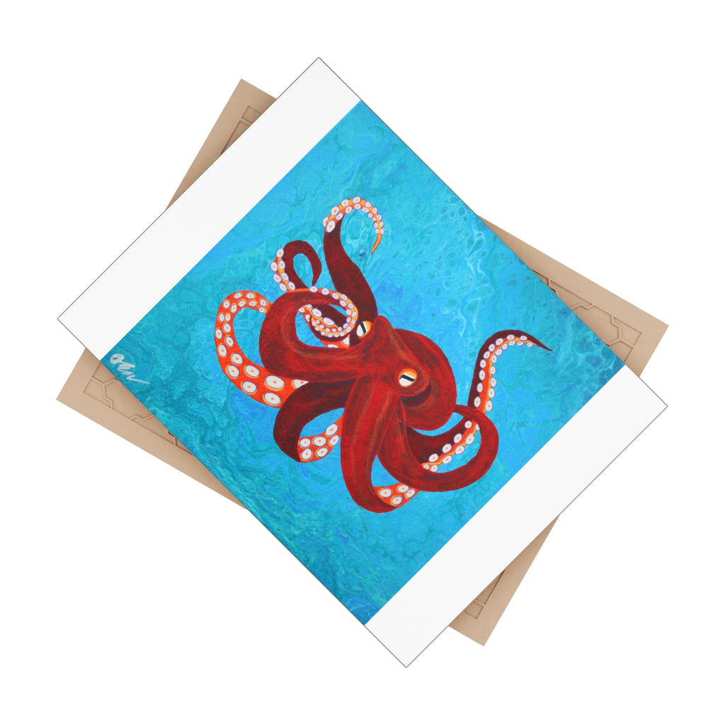 Tile with a red octopus design on a blue background, featuring a brown backing