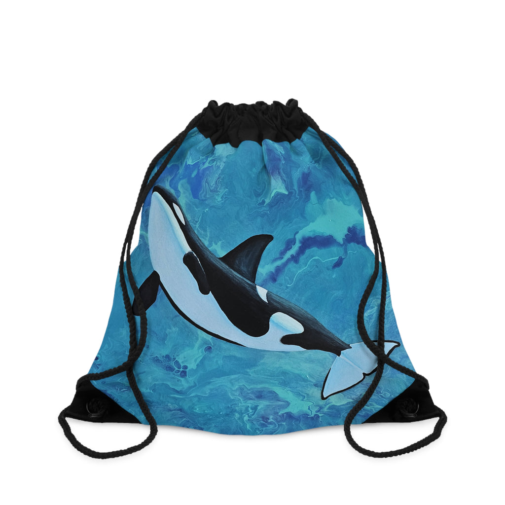 Drawstring bag with an orca whale design on a blue watercolor background