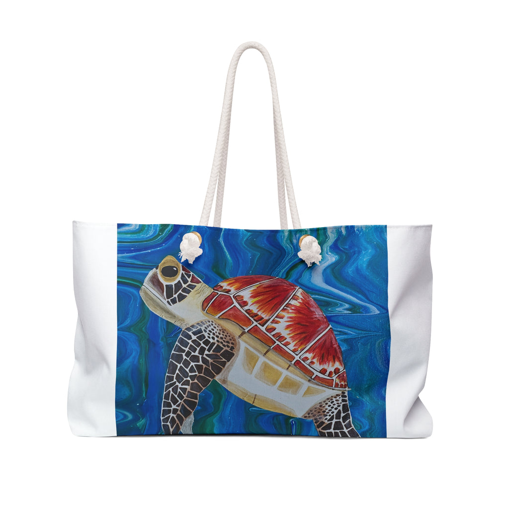 Tote bag with a turtle design on a blue and white background