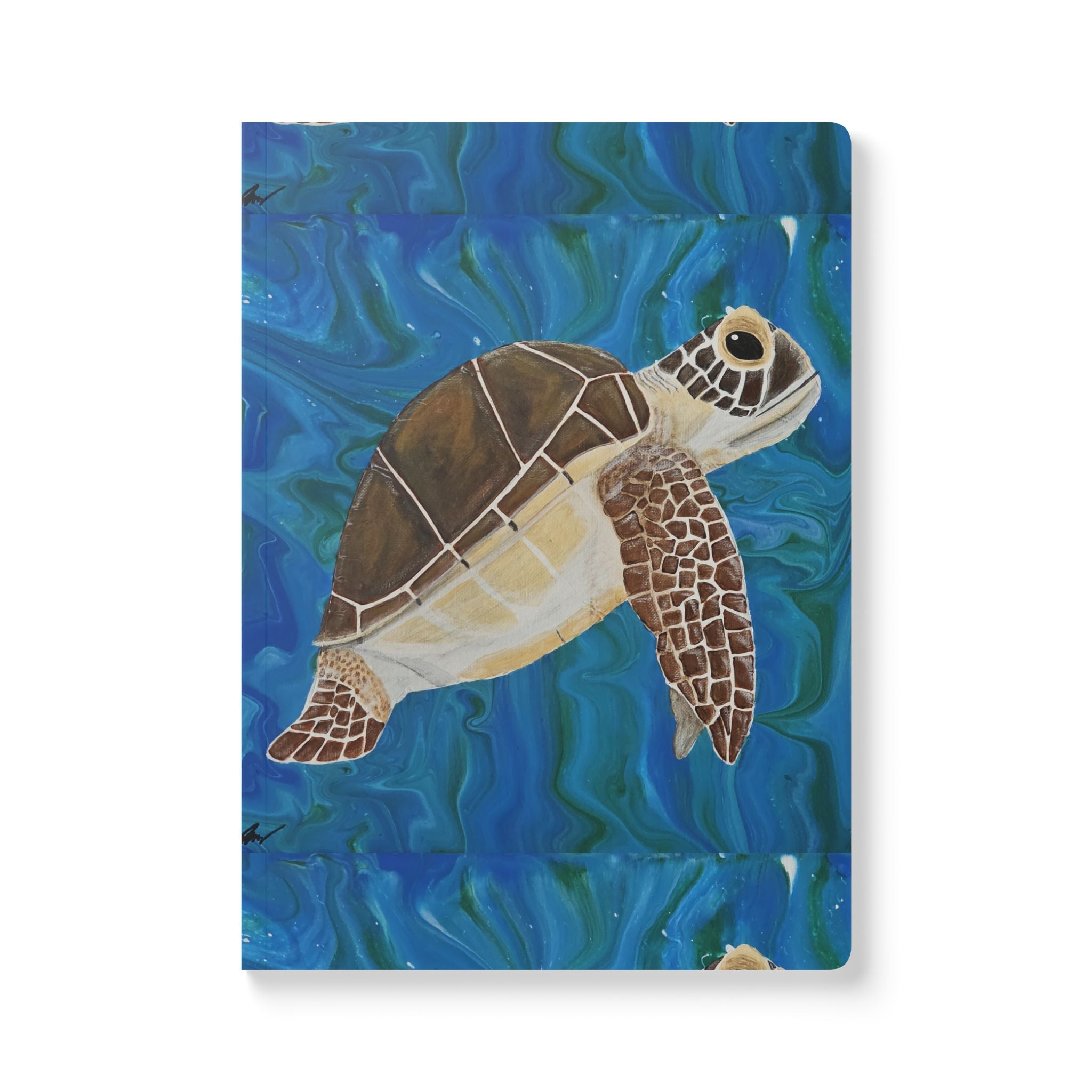 Notebook with a turtle illustration on a blue watercolor background