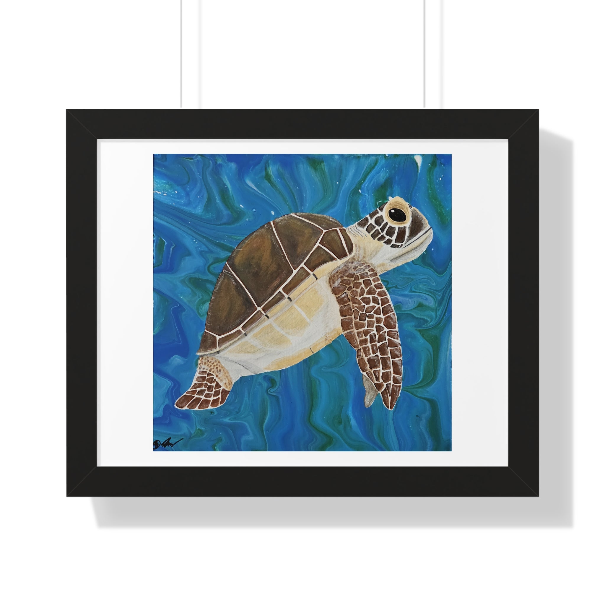 Framed artwork of a turtle swimming in blue water