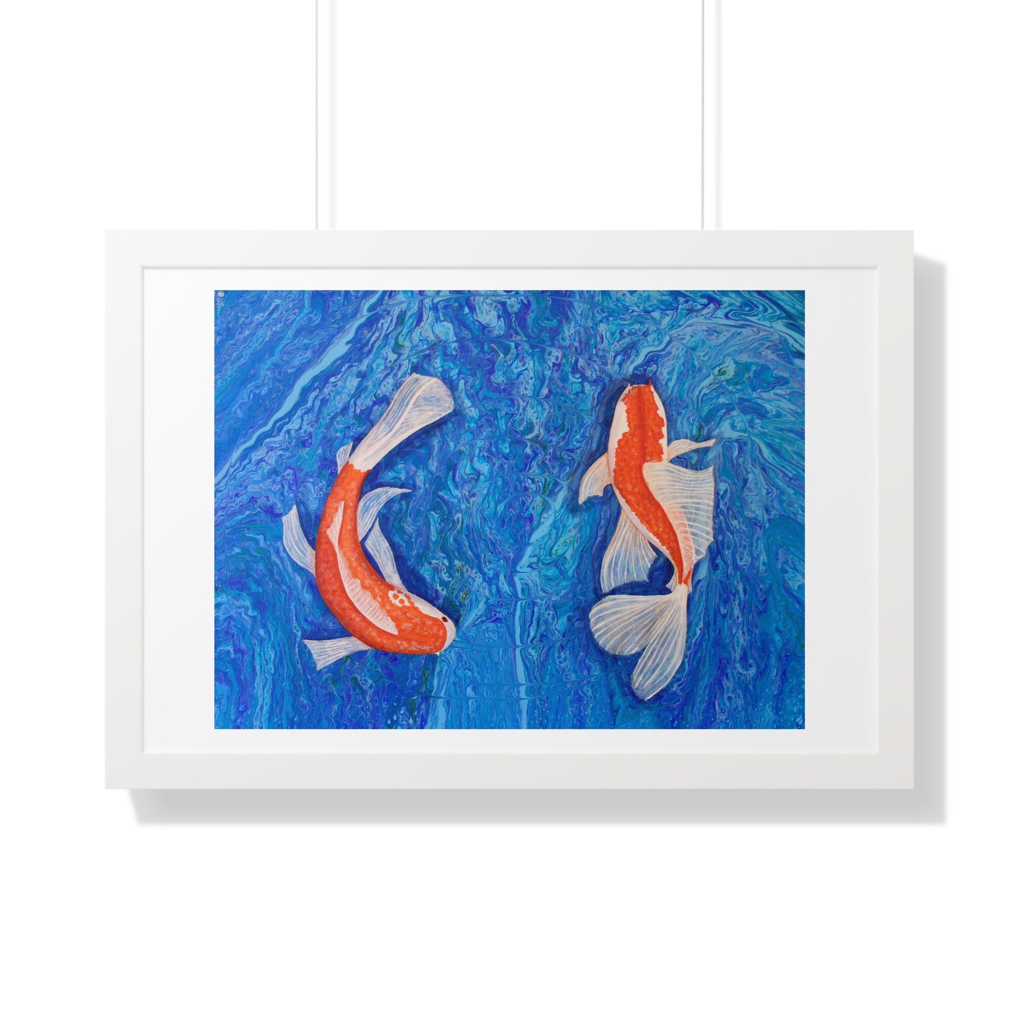 Framed artwork of two koi fish on a blue background