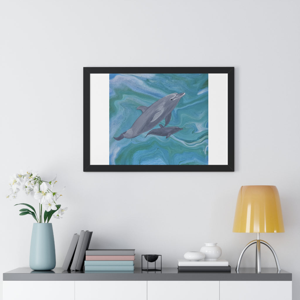 Framed artwork of dolphins on a wall above a shelf with decor items.