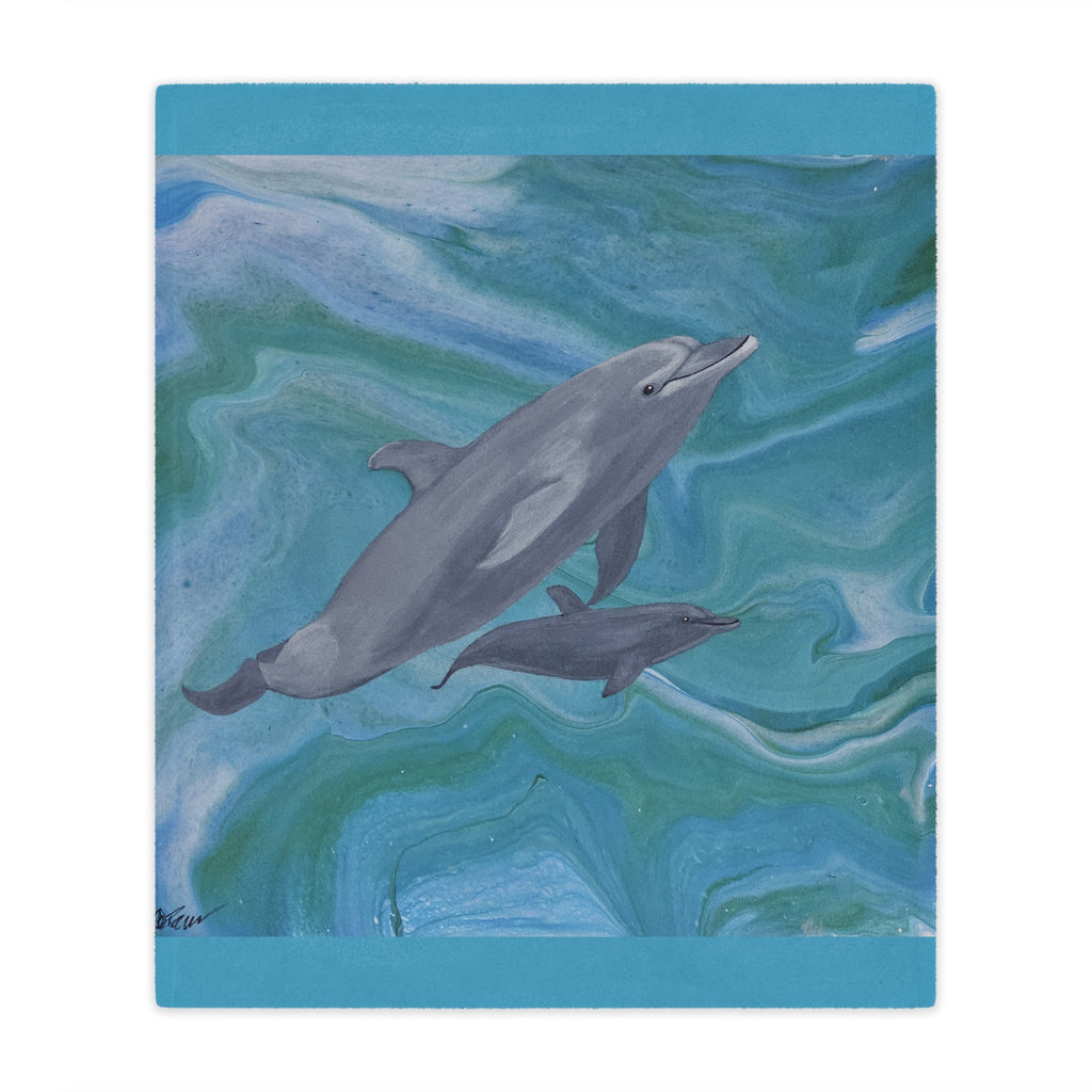 Blanket of two dolphins swimming in wavy water