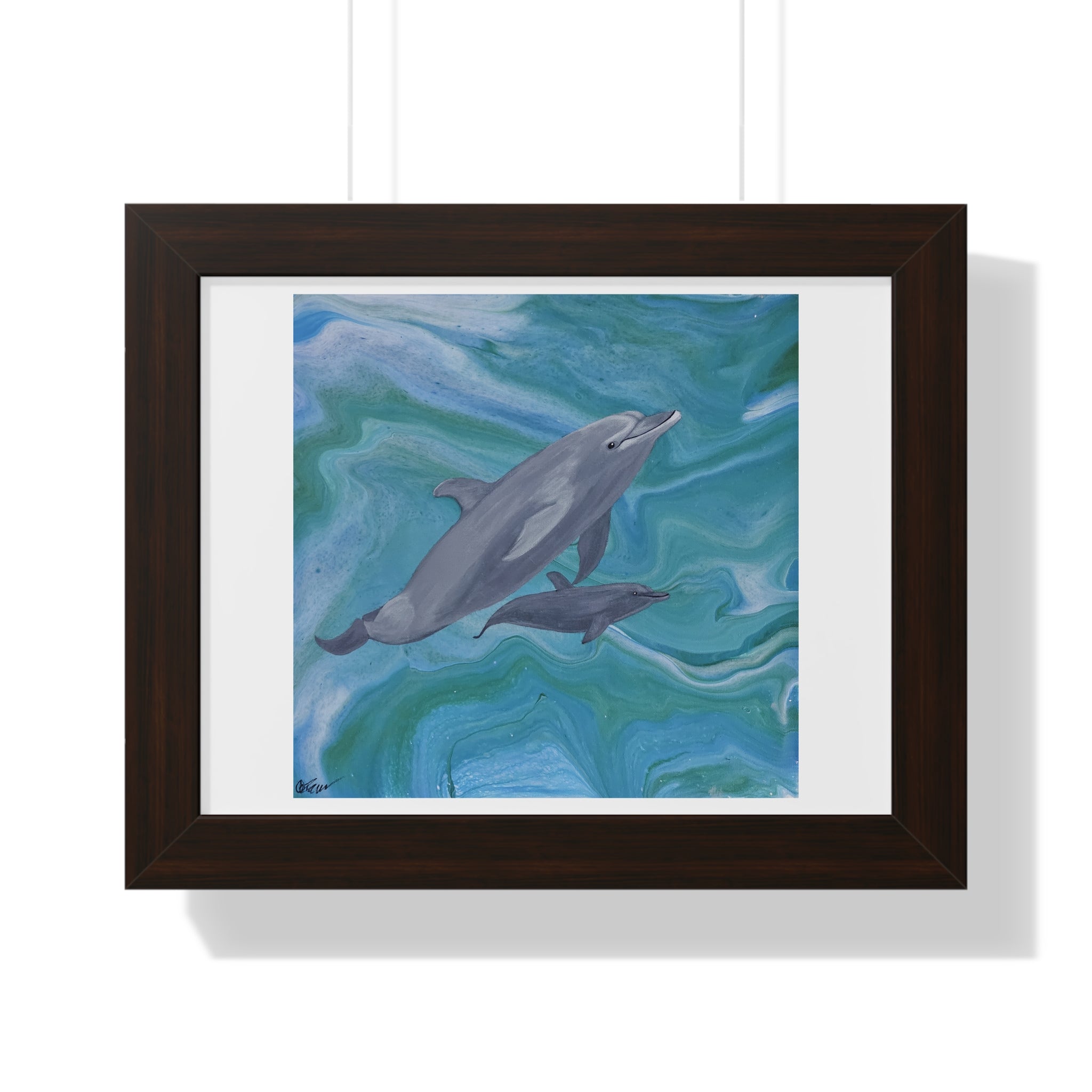 Framed artwork of two dolphins swimming in water with a white border