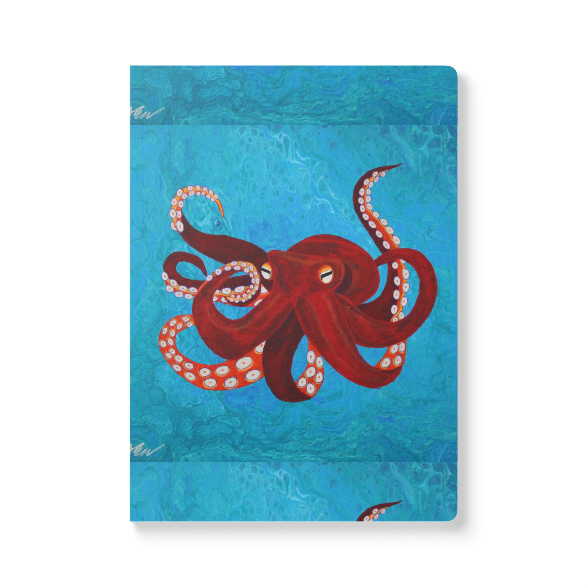Notebook with a red octopus design on a blue textured background