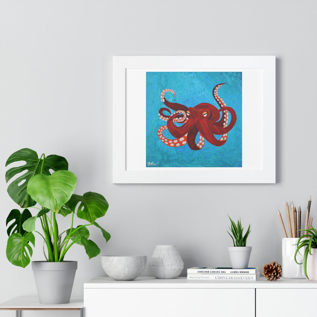 Framed artwork of a red octopus on a blue background, displayed on a wall with decorative items below.
