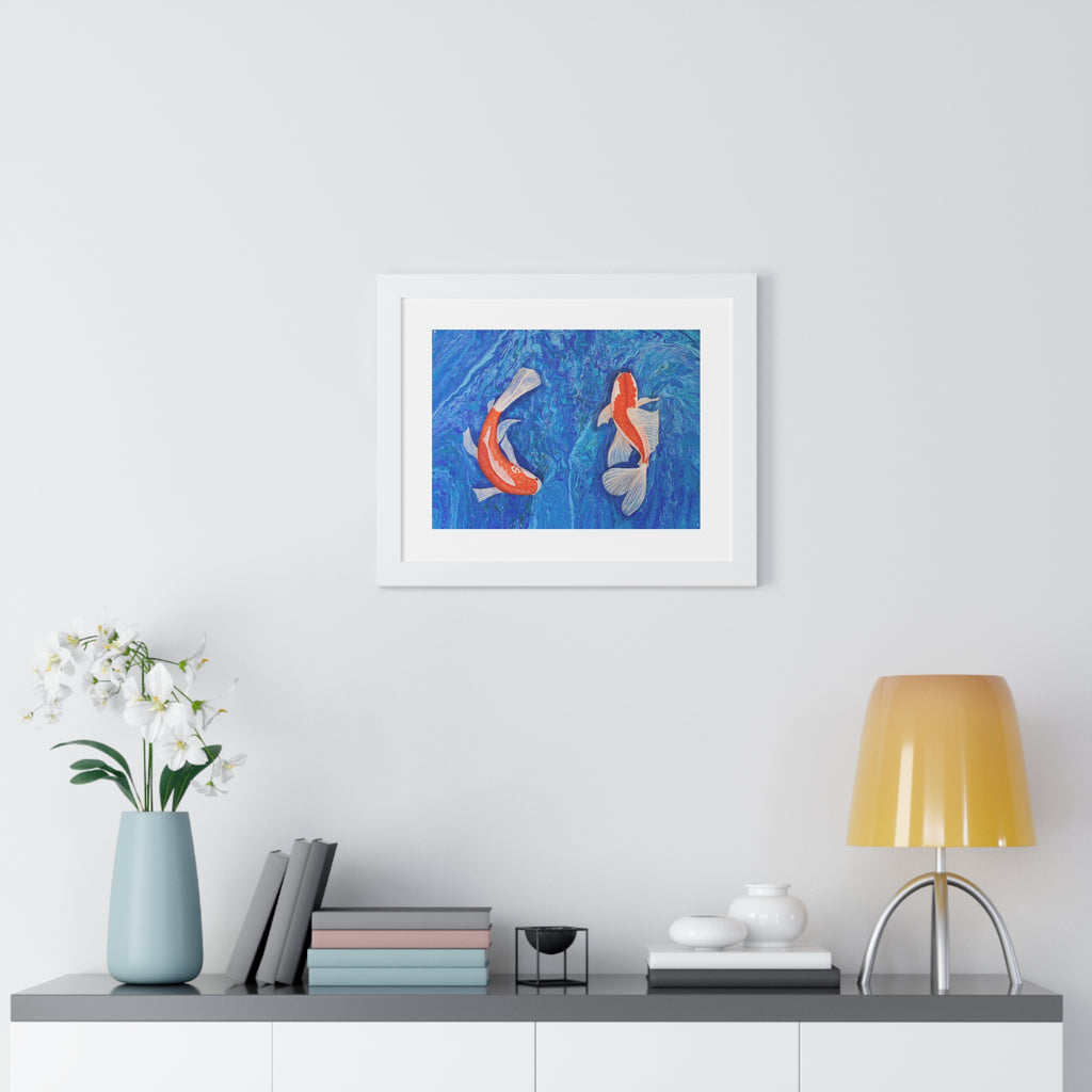Framed artwork of two koi fish on a wall above a shelf with decor items.